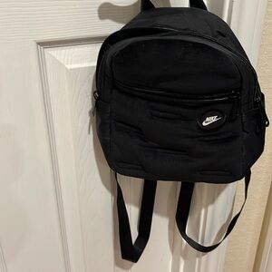 Small black Nike backpack great for kids for school